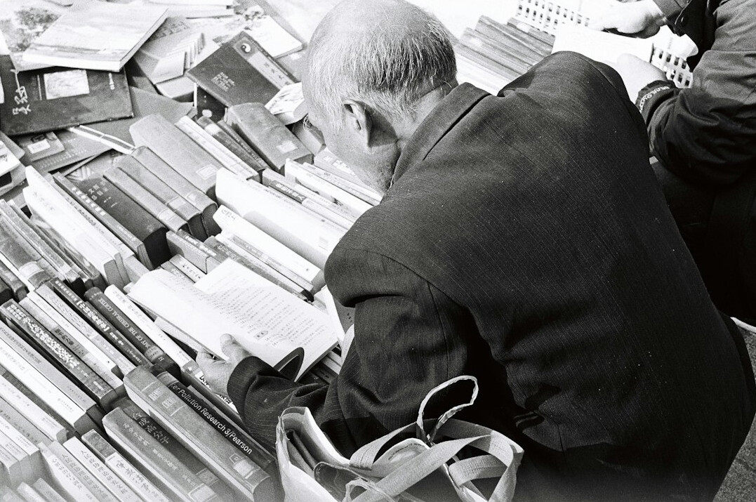 researcher examining old files